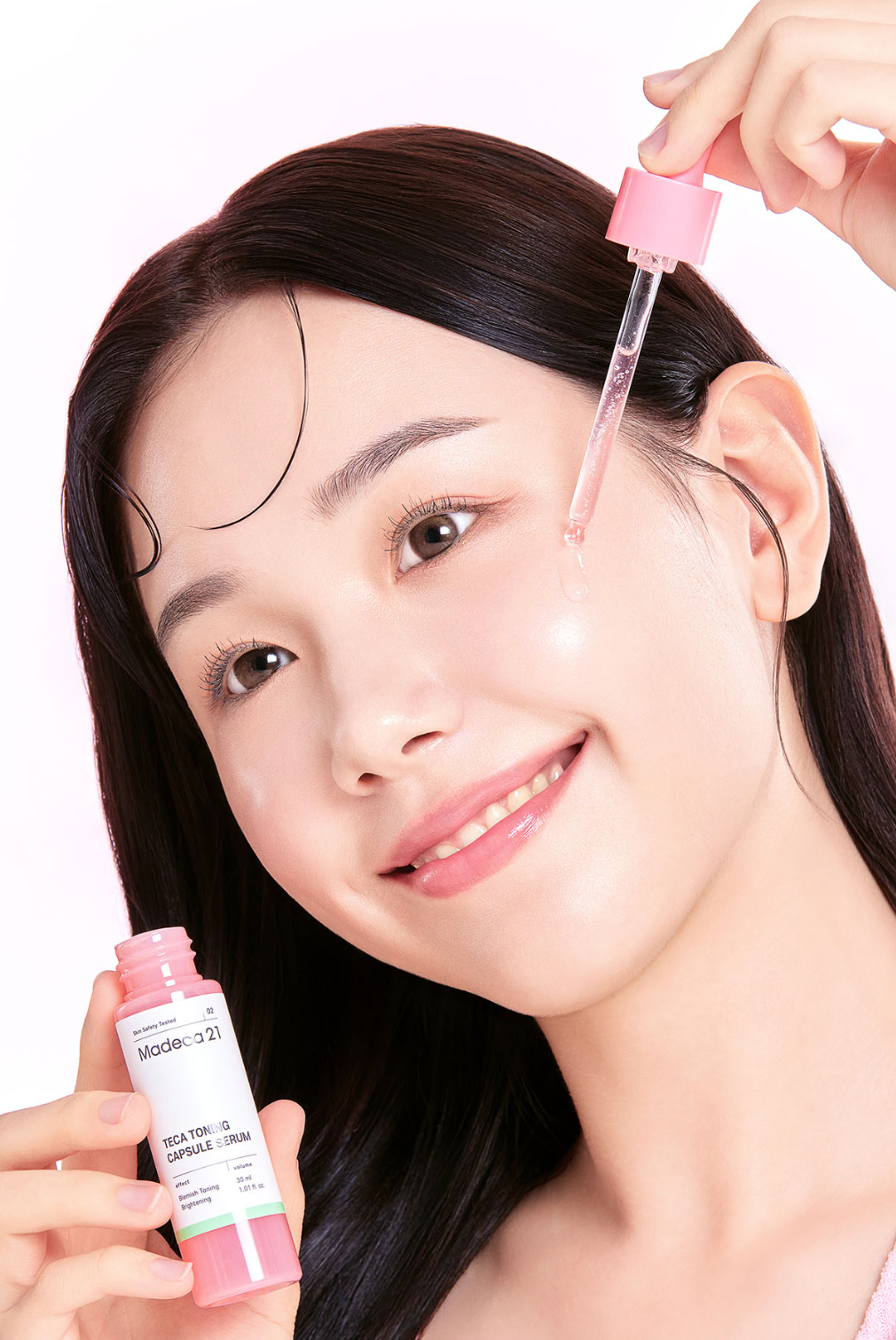 Madeca21 serum texture – lightweight watery base with pink capsules